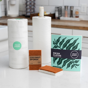 Bamboo paper towels, swish cloths and coconut sponges on kitchen counter